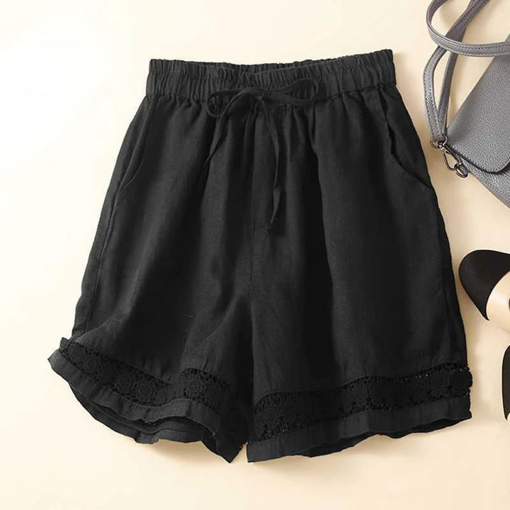 Relaxed floral shorts with elastic waist and embroidered hem