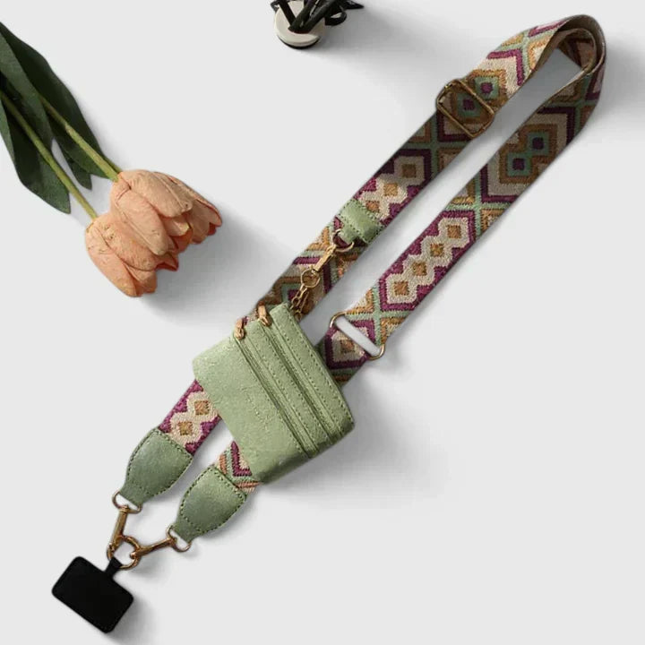 Elegant crossbody phone holder with adjustable strap and compact pocket
