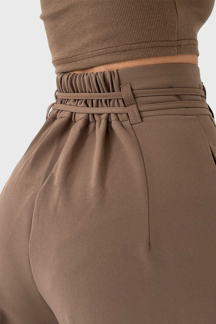 Sophie high-waisted wide-leg trousers with cord accents shown in neutral tones
