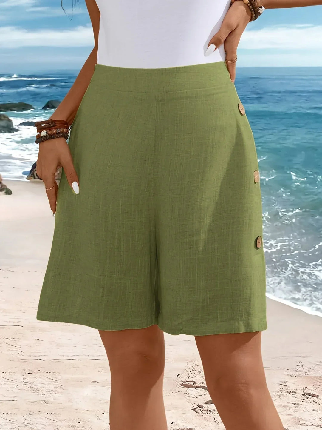 Whitney relaxed mid-thigh shorts with side-button detail and elastic waistband