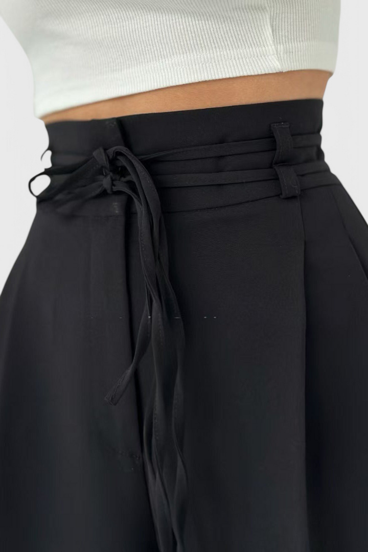 Sophie high-waisted wide-leg trousers with cord accents shown in neutral tones