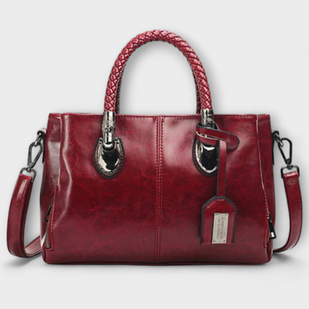 Thyra structured handbag with braided handles and shoulder strap