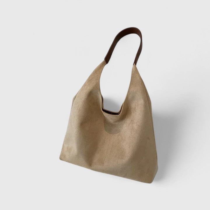 Rovena minimalist shoulder bag shown in a neutral tone with clean, simple design