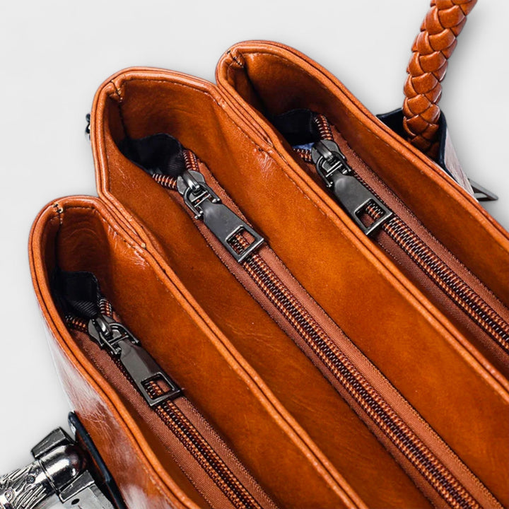 Thyra structured handbag with braided handles and shoulder strap