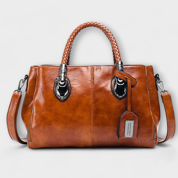 Thyra structured handbag with braided handles and shoulder strap
