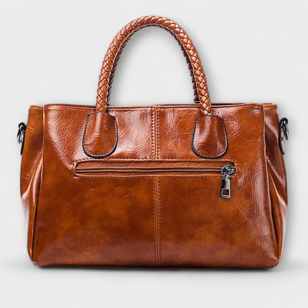 Thyra structured handbag with braided handles and shoulder strap
