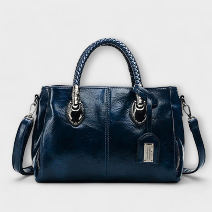 Thyra structured handbag with braided handles and shoulder strap