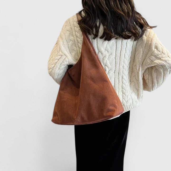 Rovena minimalist shoulder bag shown in a neutral tone with clean, simple design