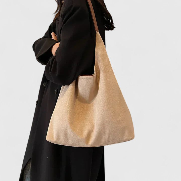 Rovena minimalist shoulder bag shown in a neutral tone with clean, simple design