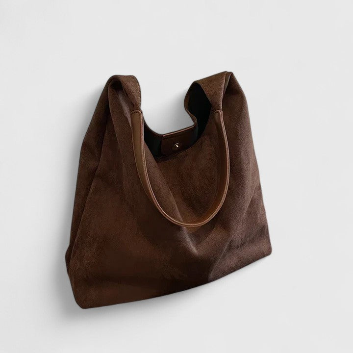 Rovena minimalist shoulder bag shown in a neutral tone with clean, simple design
