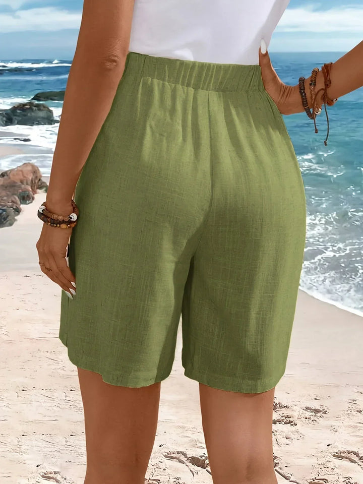 Whitney relaxed mid-thigh shorts with side-button detail and elastic waistband
