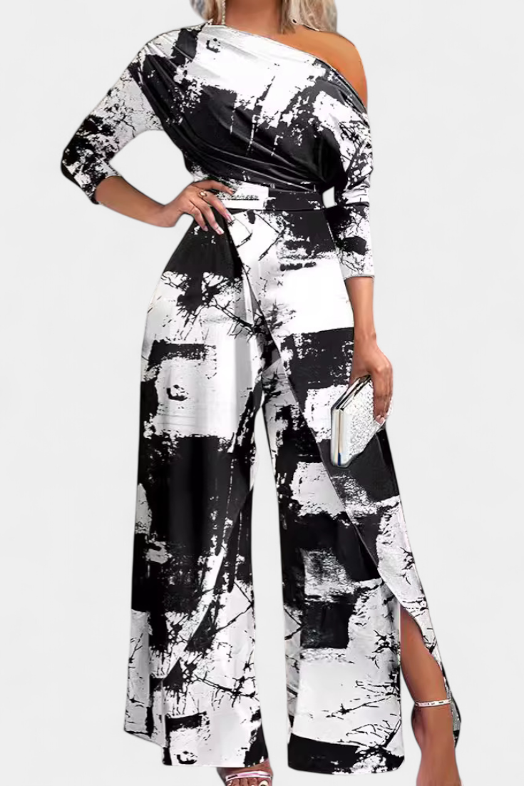 Brina asymmetrical jumpsuit with pearl-embellished shoulders and straight legs