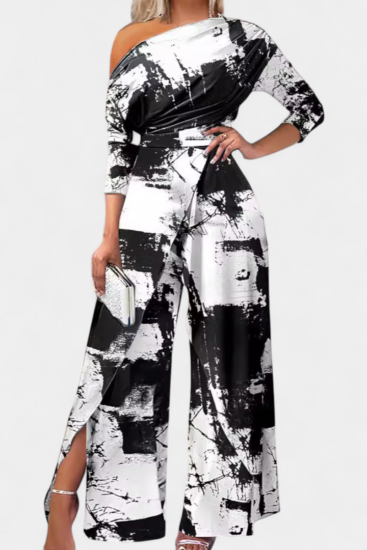 Brina asymmetrical jumpsuit with pearl-embellished shoulders and straight legs