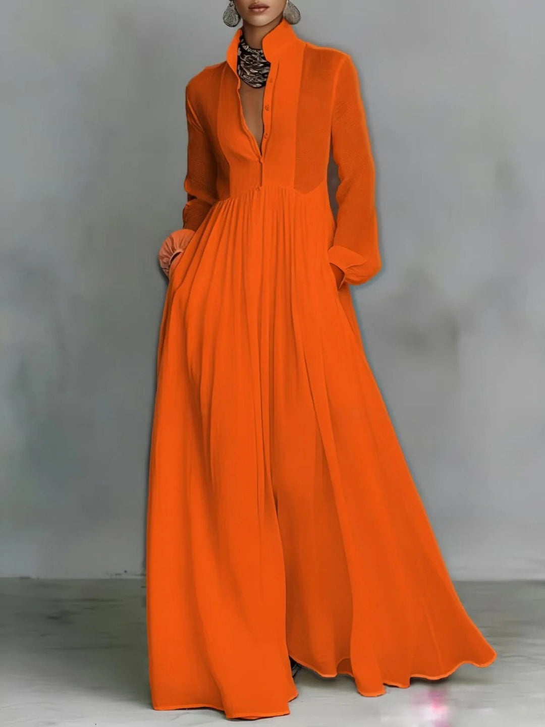 Celine flowing button-front maxi dress in orange with a fitted waist and long flowing skirt