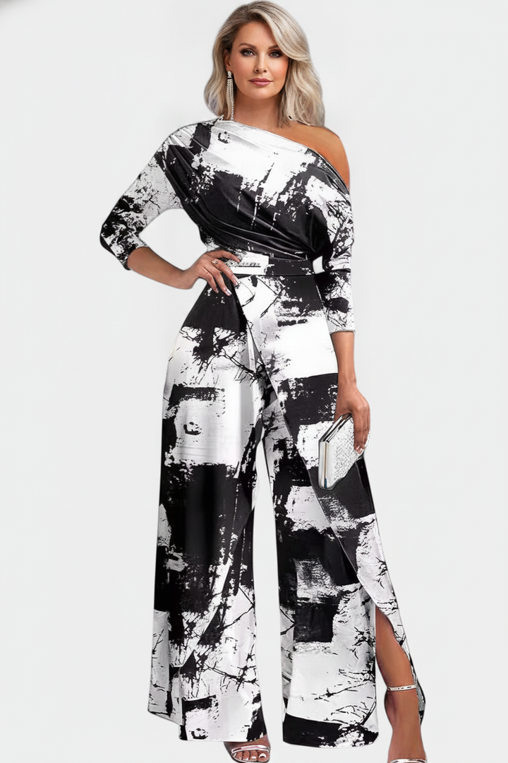 Brina asymmetrical jumpsuit with pearl-embellished shoulders and straight legs