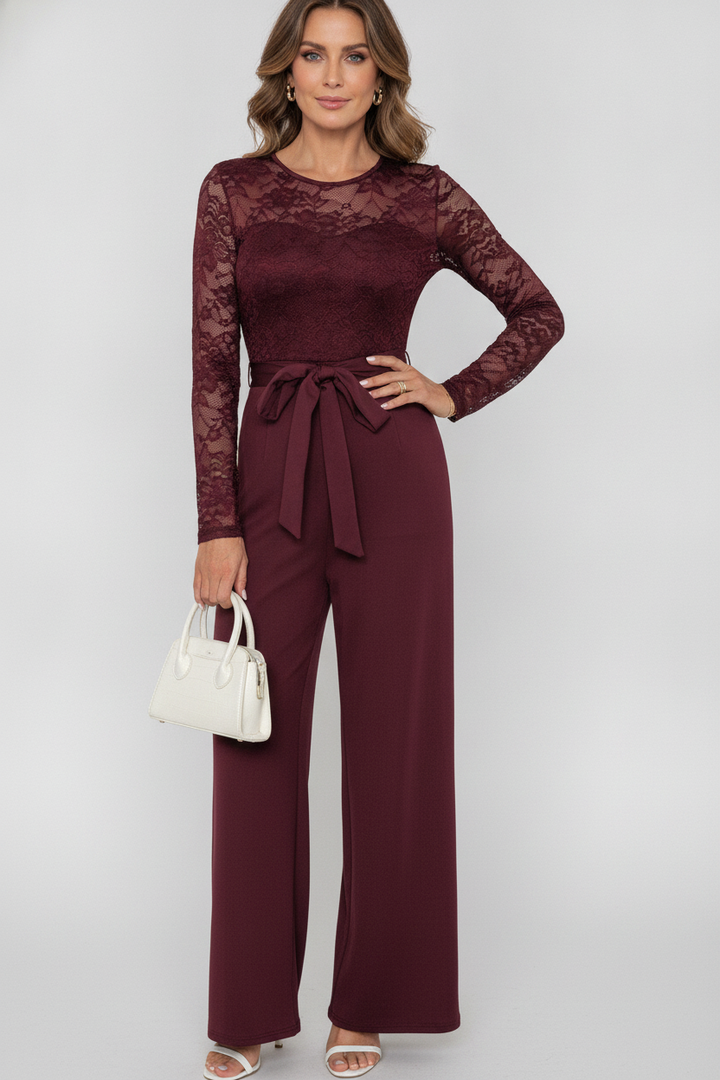 Éviana lace jumpsuit with sheer sleeves, wide-leg trousers and tied waist