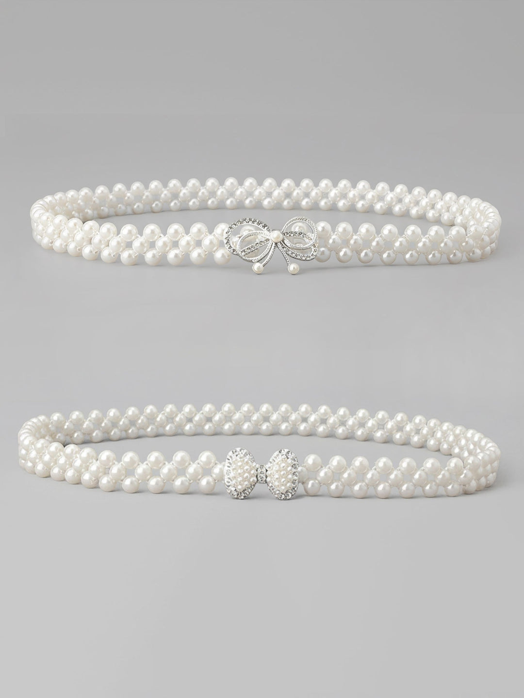 Set of two imitation pearl and rhinestone chain belts in silver and white